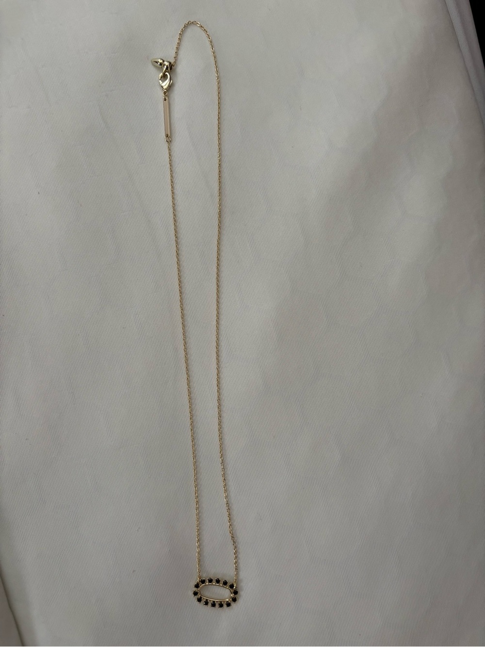 Kendra Scott Gold Necklace with Black Oval Pendant